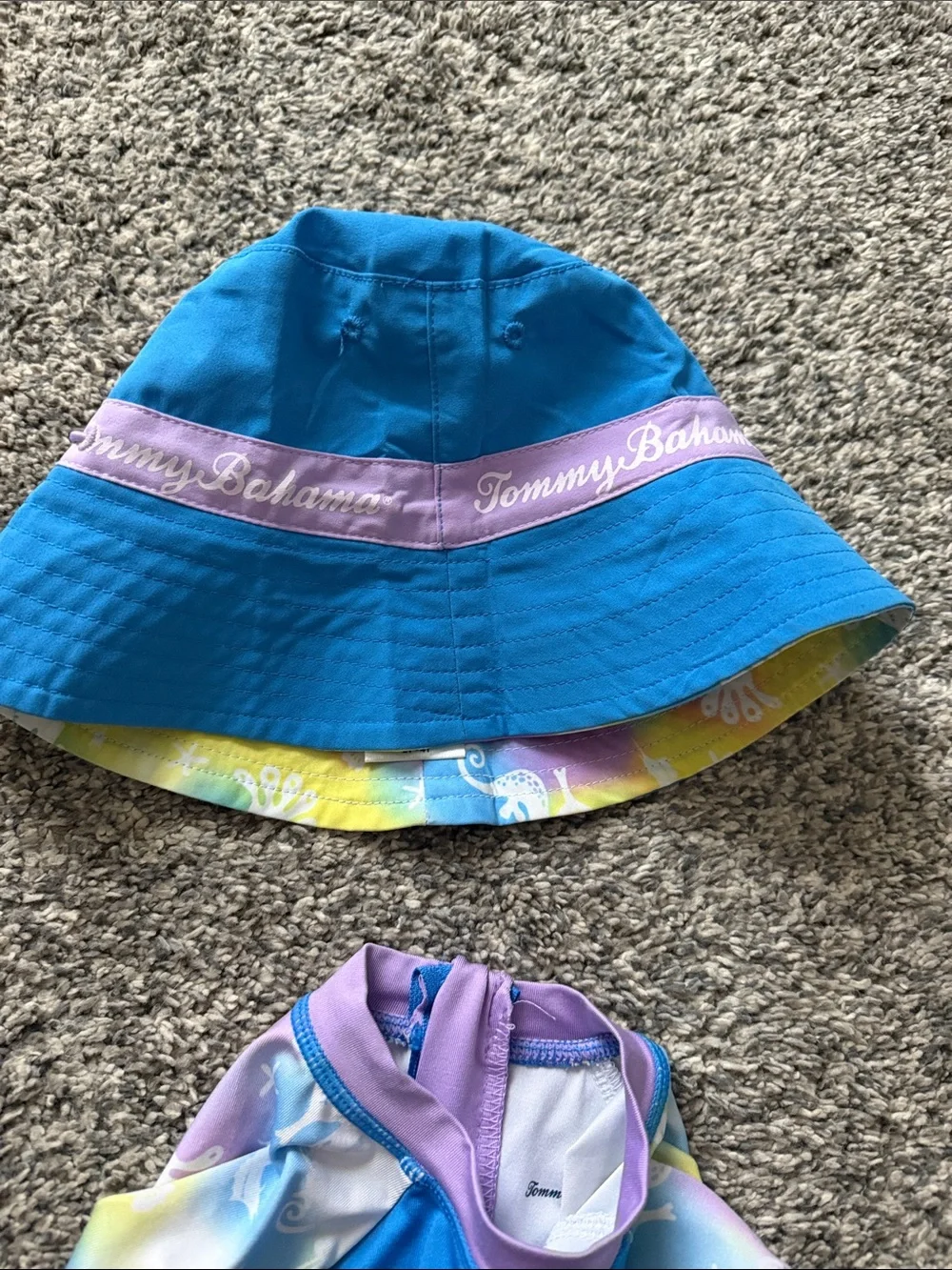 Tommy Bahama Blue One-Piece Rash Guard Swimsuit with Multicolor Sleeves and Hat